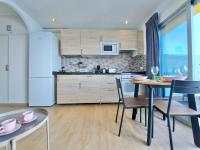 A kitchen or kitchenette at Coastview Terrace Studio by TOR