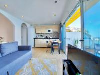A kitchen or kitchenette at Coastview Terrace Studio by TOR