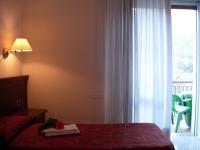 Posteľ alebo postele v izbe v ubytovaní HOTEL BELVEDERE