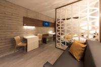 Microtel Inn & Suites by Wyndham Guadalajara Surにあるシーティングエリア
