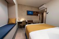 Microtel Inn & Suites by Wyndham Guadalajara Surにあるベッド