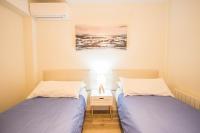 Postel nebo postele na pokoji v ubytování Hípica Apartment Granada