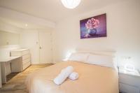 Postel nebo postele na pokoji v ubytování Hípica Apartment Granada
