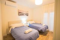 Postel nebo postele na pokoji v ubytování Hípica Apartment Granada