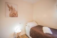 Postel nebo postele na pokoji v ubytování Hípica Apartment Granada