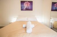 Postel nebo postele na pokoji v ubytování Hípica Apartment Granada