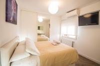 Postel nebo postele na pokoji v ubytování Hípica Apartment Granada