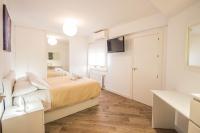 Postel nebo postele na pokoji v ubytování Hípica Apartment Granada