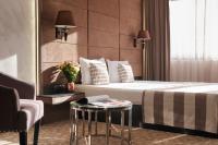 Postel nebo postele na pokoji v ubytování Grand Hotel Bansko - Fitness & SPA