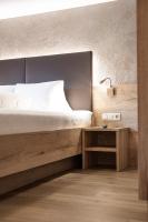 A bed or beds in a room at Gustls Ferienhäusl