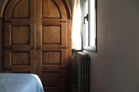 Postel nebo postele na pokoji v ubytování Apartamentos Casa Pochetas