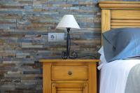 Postel nebo postele na pokoji v ubytování Apartamentos Casa Pochetas