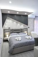 A bed or beds in a room at B&B The Dream