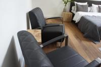Postel nebo postele na pokoji v ubytování B&B en Boshuis Darthuizerpoort