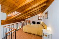 A bed or beds in a room at Il Borgo