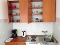 Una cocina o cocineta en Diana Rooms and Apartments