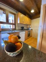 A kitchen or kitchenette at Aparthotel Areu