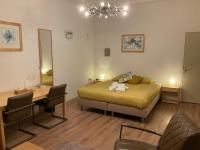 Een bed of bedden in een kamer bij Plato by Hofstad Studio’s