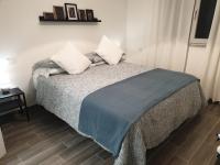 Łóżko lub łóżka w pokoju w obiekcie Residenza Tarzanà