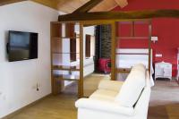 TV a/nebo společenská místnost v ubytování Caxila Apartamentos Rurales - Luarca