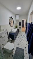 Kúpeľňa v ubytovaní Apartman H8