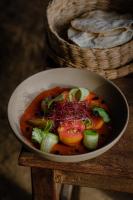 een kom eten op een houten tafel bij Paradero Todos Santos - Exclusive experiences included in Todos Santos