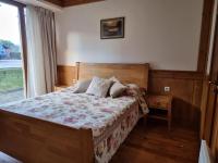 Postel nebo postele na pokoji v ubytování Pirin Golf Hotel Private Studios