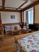 Posezení v ubytování Pirin Golf Hotel Private Studios