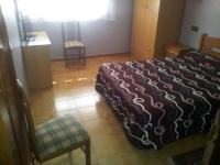 Postel nebo postele na pokoji v ubytování Hotel Los Nogales