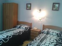 Postel nebo postele na pokoji v ubytování Hotel Los Nogales
