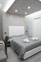 A bed or beds in a room at B&B The Dream