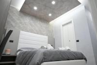 A bed or beds in a room at B&B The Dream