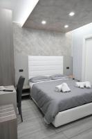 A bed or beds in a room at B&B The Dream