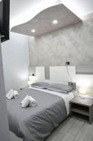 A bed or beds in a room at B&B The Dream