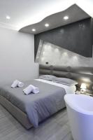 A bed or beds in a room at B&B The Dream