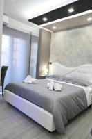 A bed or beds in a room at B&B The Dream