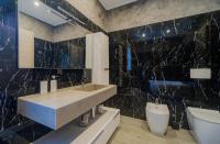 Kúpeľňa v ubytovaní Villa Liam con Piscina - Goelba