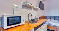 Kuchyňa alebo kuchynka v ubytovaní Apartamenty na Deptaku by Royal Aparts