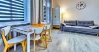 Posedenie v ubytovaní Apartamenty na Deptaku by Royal Aparts