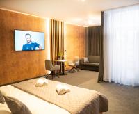 Postel nebo postele na pokoji v ubytování Hotel JeštěBrno
