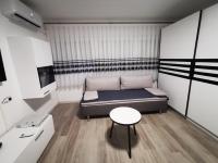 Posteľ alebo postele v izbe v ubytovaní Ema Studio Apartman