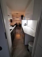 Kuchyňa alebo kuchynka v ubytovaní Ema Studio Apartman