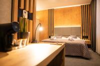 Postel nebo postele na pokoji v ubytování Hotel JeštěBrno