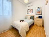 Postel nebo postele na pokoji v ubytování Amplio apartamento en pleno corazón de Alicante