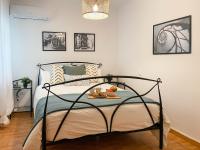 Postel nebo postele na pokoji v ubytování Amplio apartamento en pleno corazón de Alicante