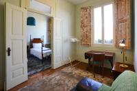 Postel nebo postele na pokoji v ubytování Maison des Amis Porto