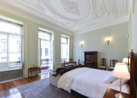 Postel nebo postele na pokoji v ubytování Maison des Amis Porto