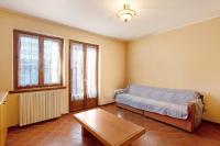 A bed or beds in a room at Chalet Meridiana Appartamento 8
