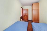 A bed or beds in a room at Chalet Meridiana Appartamento 8