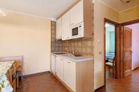 A kitchen or kitchenette at Chalet Meridiana Appartamento 8
